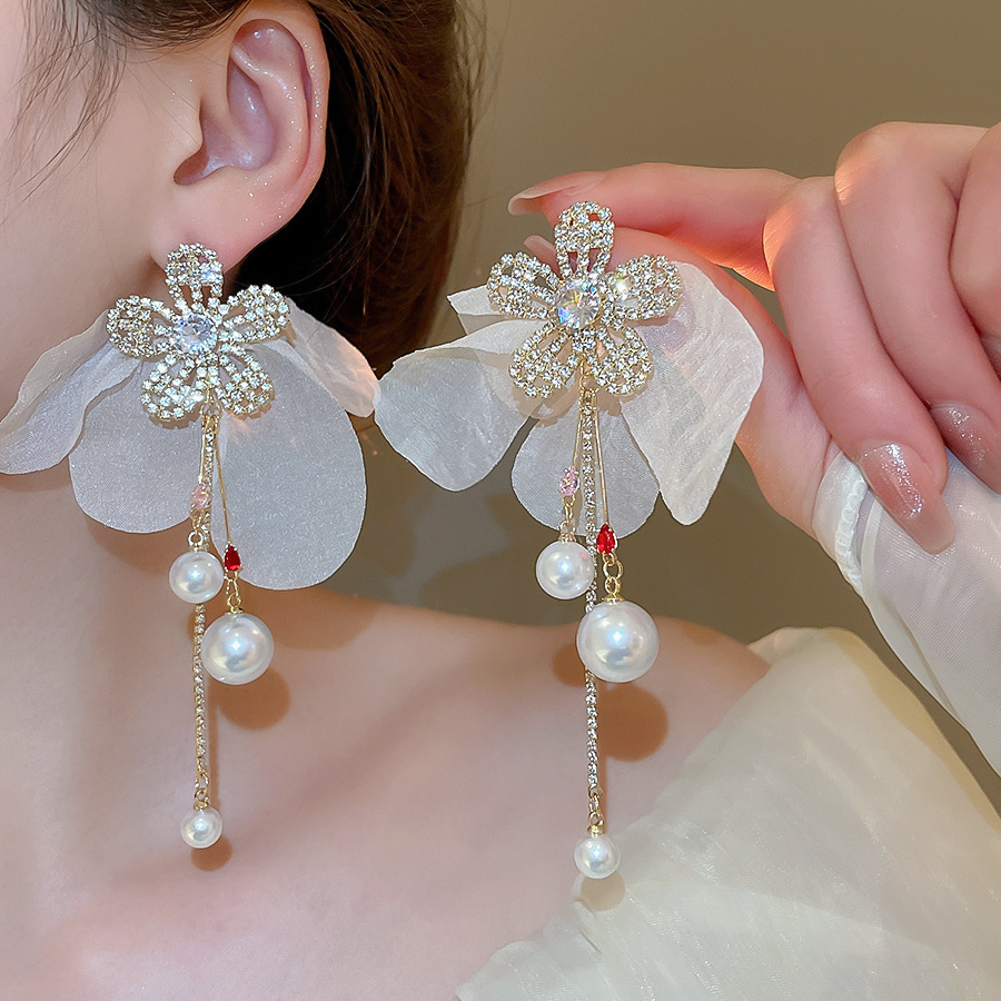 Pendientes de malla de pétalo de dopamina Pendientes de estilo de vacaciones junto al mar de estilo nuevo estilo caliente Pendientes de temperamento exagerado de todo fósforo al por mayor