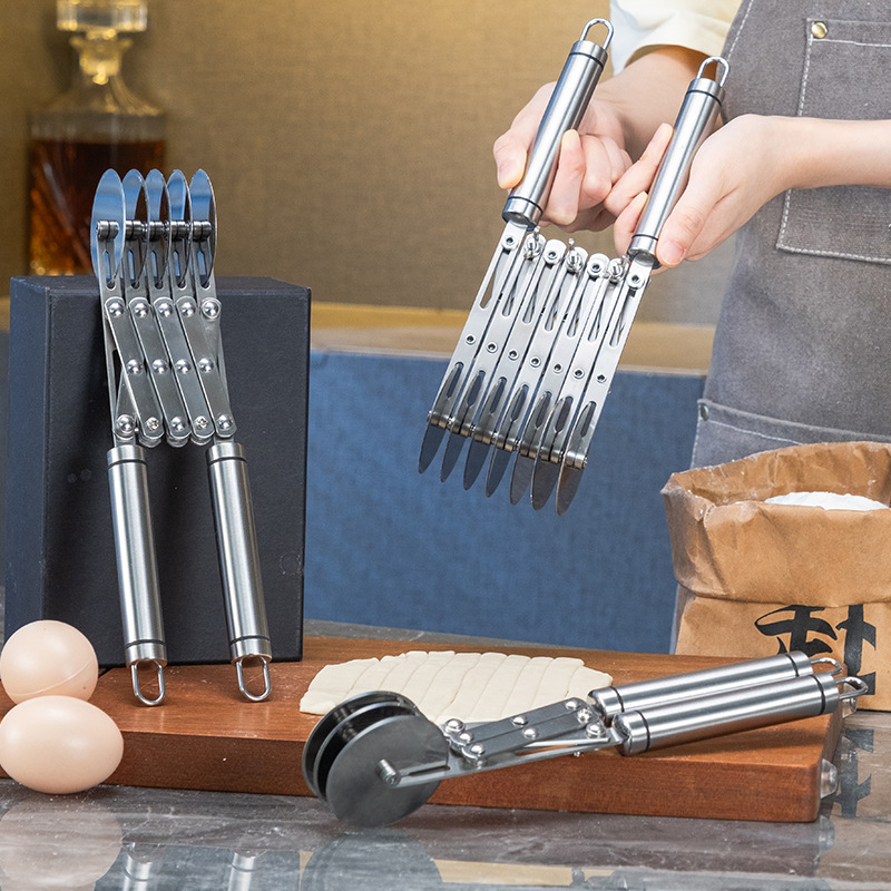 Mango de alambre negro Acero inoxidable Cuchillo de barras de masa de múltiples ruedas Cuchillo de rueda de pizza Cuchillo de merengue danés Cuchillo de cocina