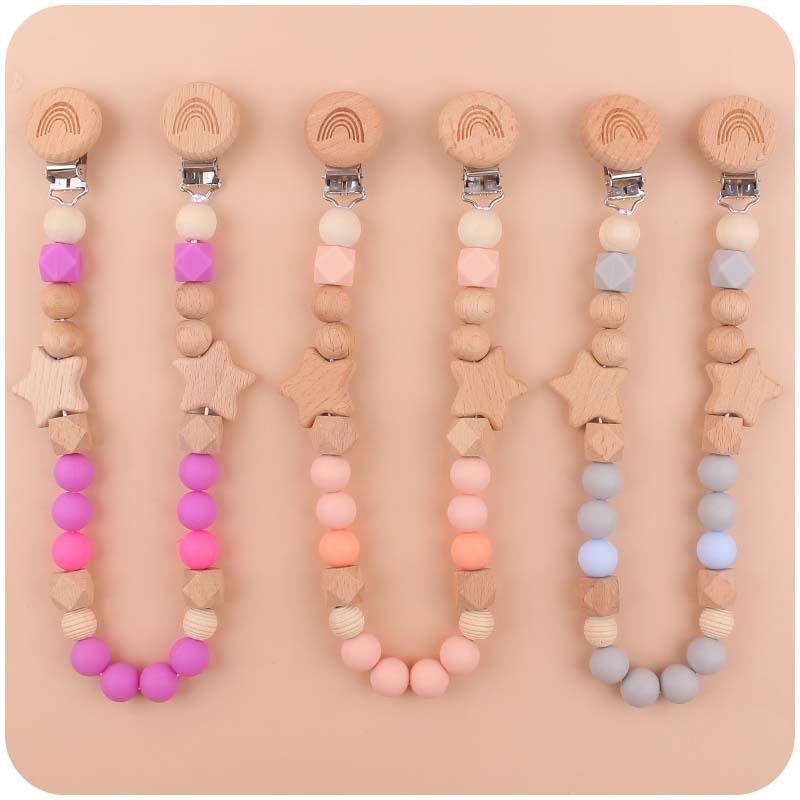 Nuevo bebé suministros dibujos animados silicona Arco Iris mordedor calmante bebé chupete cadena coche colgando mordedor conjunto de cuatro piezas