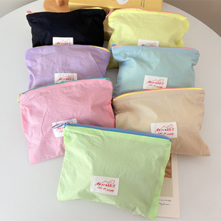 A batch of new Macaron color cosmetic bag portable mini jewelry bag cute small bag change purse