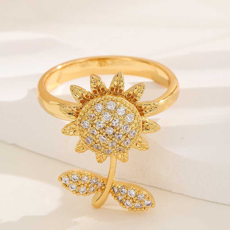 18K oro real color-preservar la suerte de la hierba estilo coreano transfronterizo diamante incrustado rotación de moda abierto anillo ajustable