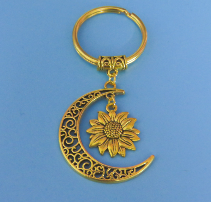 欧美跨境饰品 古金色镂空月亮 向日葵钥匙扣 女士包包钥匙扣挂饰