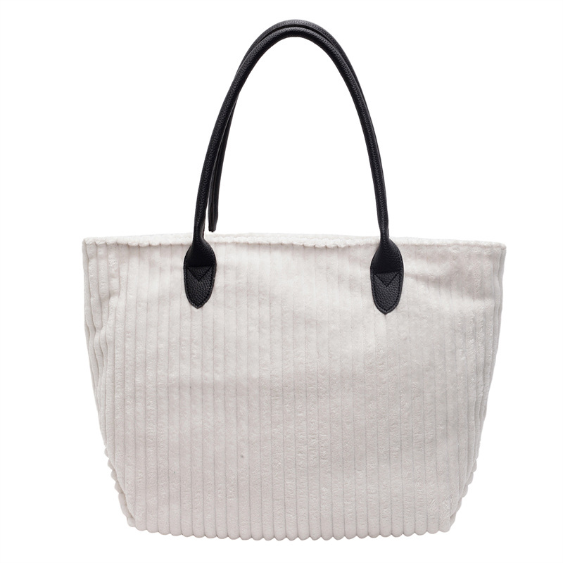 Bolso de terciopelo a rayas de gran capacidad para mujer 2024 otoño e invierno nuevo bolso de compras de un solo hombro de todo fósforo bolso de viaje de clase de todo fósforo