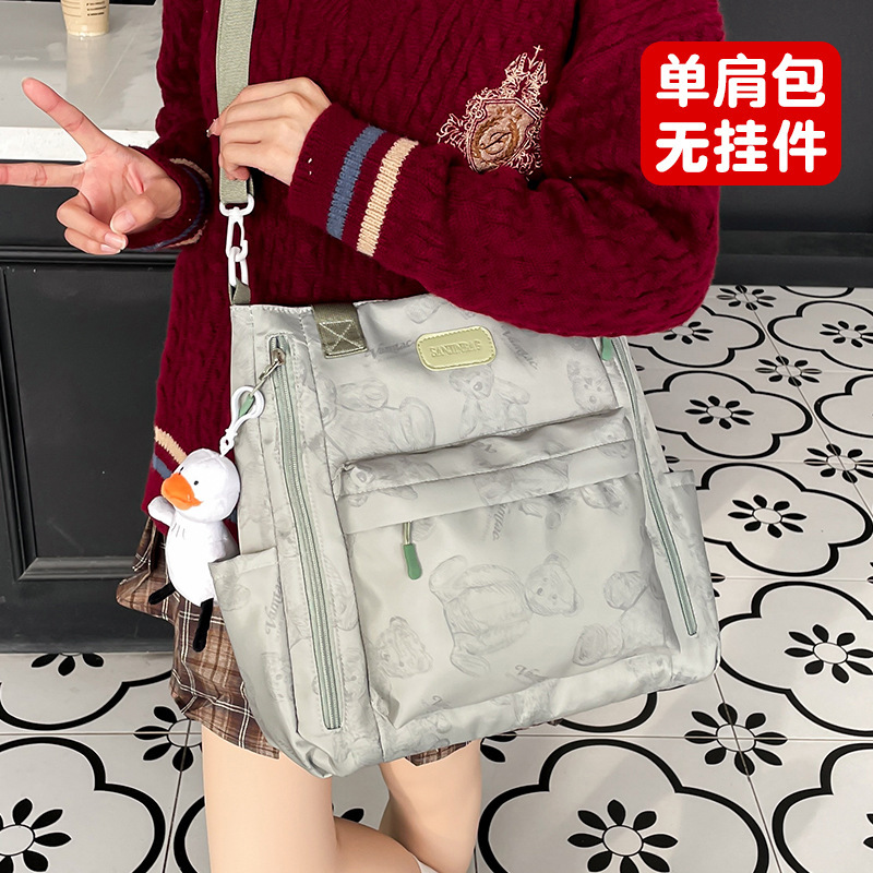 熊のかばんの女性insキャンパスのシンプルなランドセルの高校生は中学生の大容量のコンピュータのリュックサックに行きます。|undefined