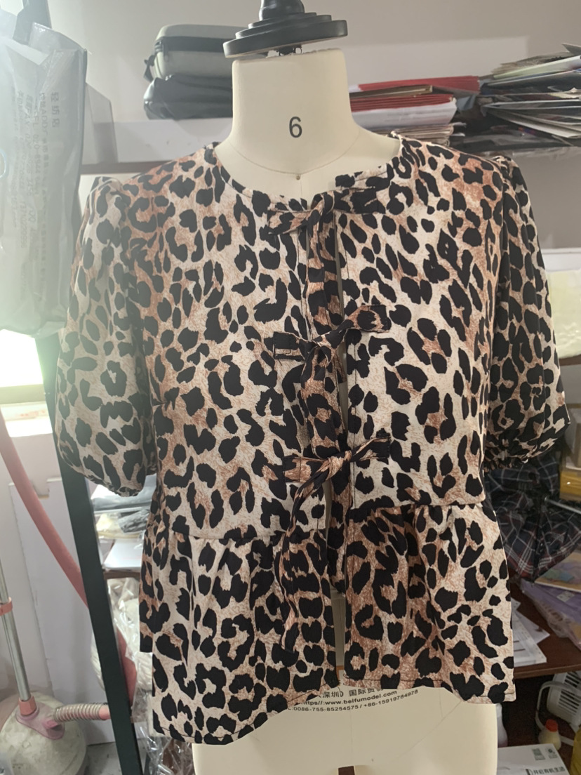 245g Weight Short Sleeve Sleeve Length Single Breasted Placket Type Regular Sleeve Sleeve Type Polyester Fabric Type Short Top Length Blouse Tops Type Daily Occasion Round Neck Neckline Loose Fit Type Leopard Pattern Summer Season Women's Gender Streetwear Style Wholesale Women's Streetwear Leopard Short Sleeve Blouses 9