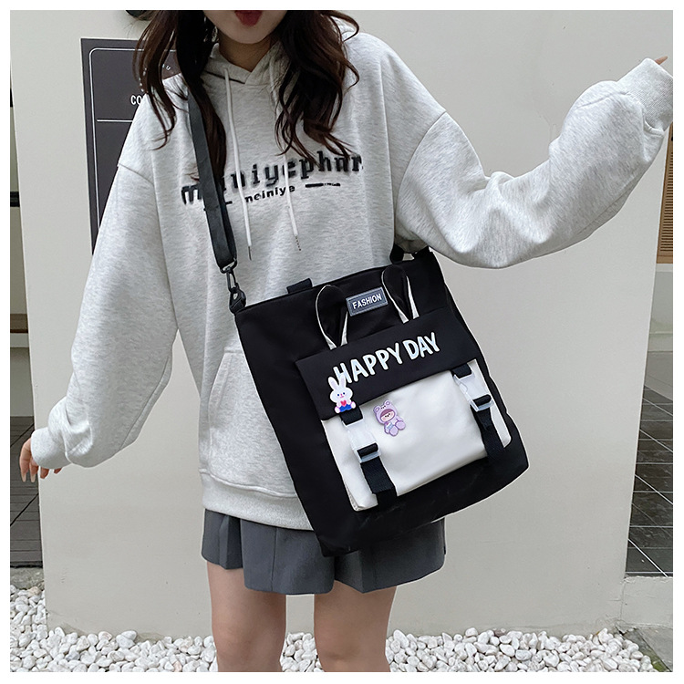 Large-capacity file bag, primary school student handbag that can be carried on one shoulder, book bag for girls with high appearance standards, homework books and test papers bag undefined