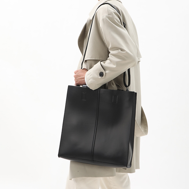 Korean version of fashionable PU leather shoulder bag, simple commuter men's and women's tote bag, square vertical crossbody large-capacity handbag_voghion.com