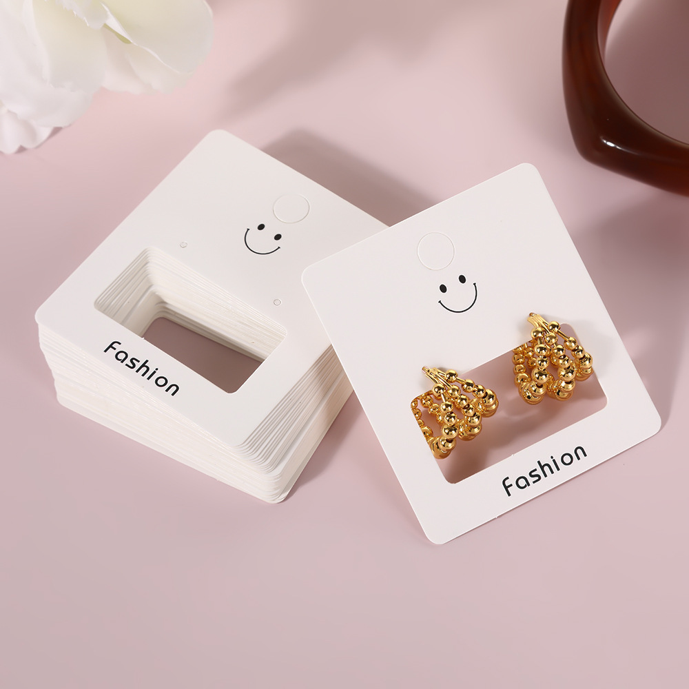Fábrica directa sonrisa pendientes pendientes joyas embalaje cartón DIY joyas de moda embalaje cartón al por mayor
