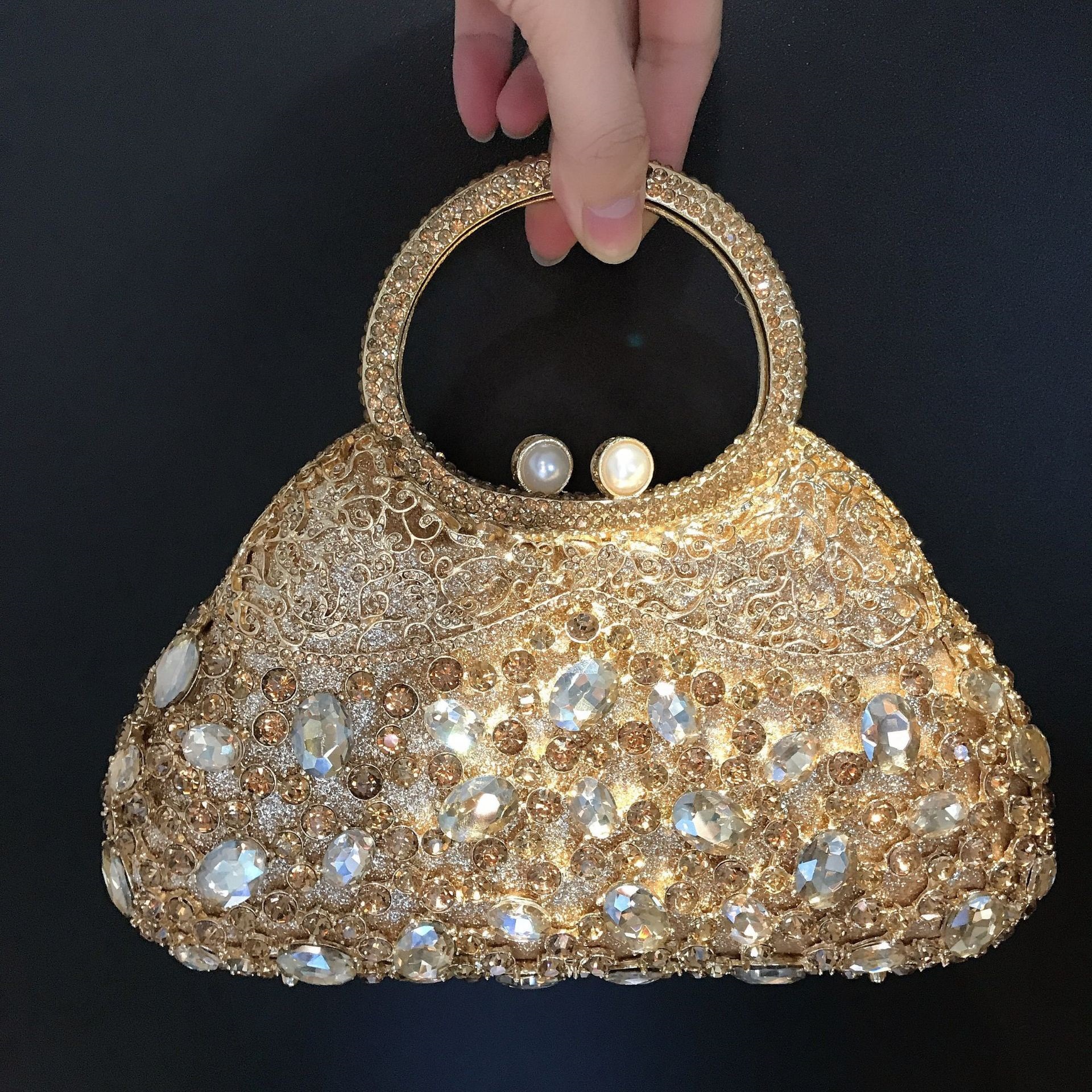 Bolso de piedra estricta hueco metal con diamantes bolso de banquete europeo y americano bolso de mujer