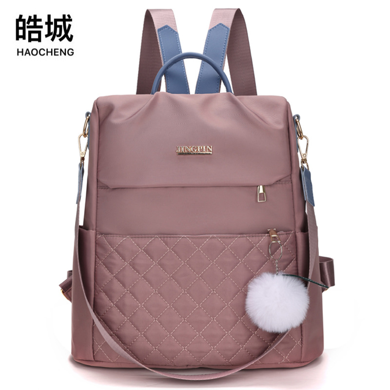 Mochila antirrobo de nailon para mujer 2023 nuevo estilo casual de gran capacidad mochila de viaje de doble uso mochila de diamantes al por mayor