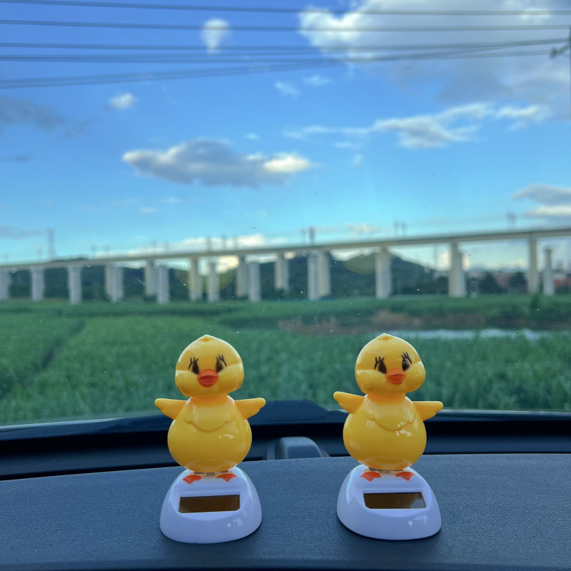汽车太阳能摆件卡通车载装饰饰品创意摇头可爱公仔礼品 厂家直销详情1