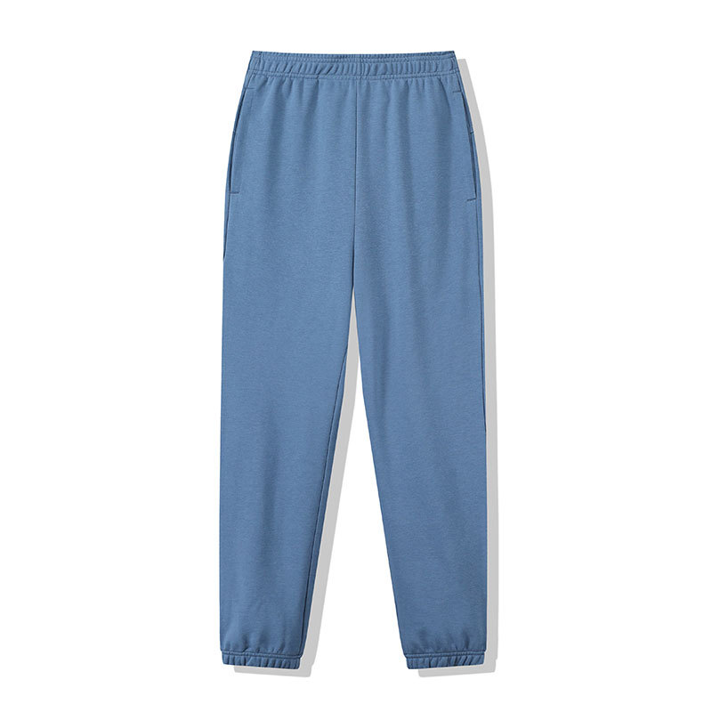 Pantalones deportivos casuales de color sólido de los hombres y las mujeres mismo peinado algodón luz tablero impreso cordón fitness correr suéter pantalones largos