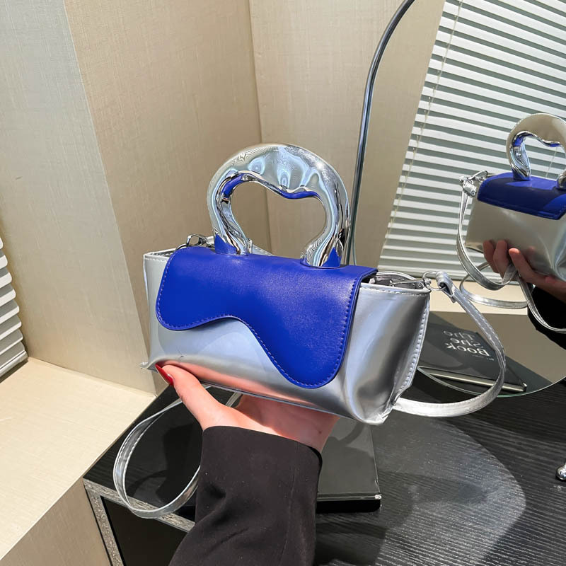 Bolso femenino de alta calidad Xiaoqing 2025 nuevo bolso cuadrado pequeño diseño de nicho bolso pequeño brillante de mensajero de un solo hombro