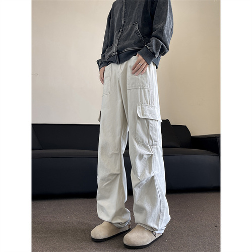 American-style functional multi-pocket casual lumberjack overalls—unisex, versatile, relaxed-fit, with slightly flared wide legs and a parachute-inspired design for spring and fall.