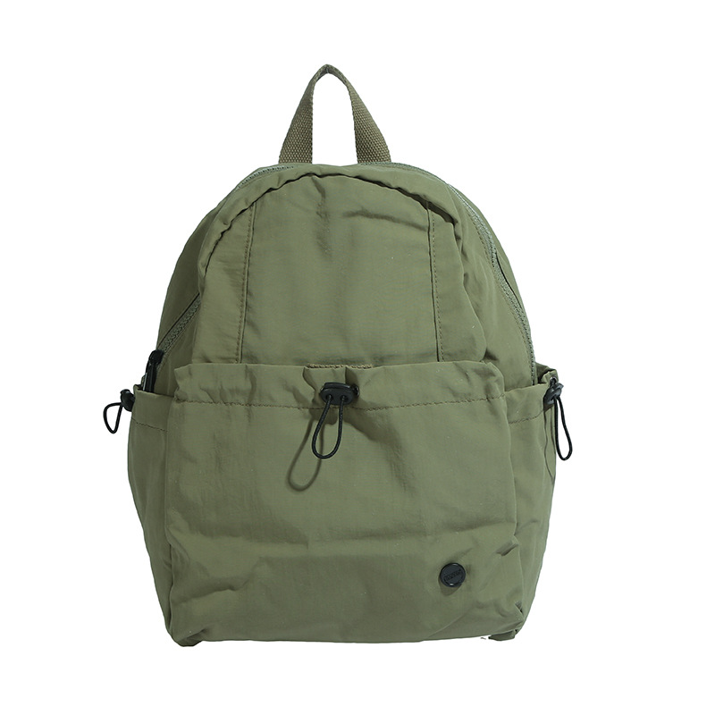 Mochila escolar de gran capacidad para estudiantes de primaria, color sólido simple, mochila casual ligera para niños y niñas 2025 nueva mochila para niños