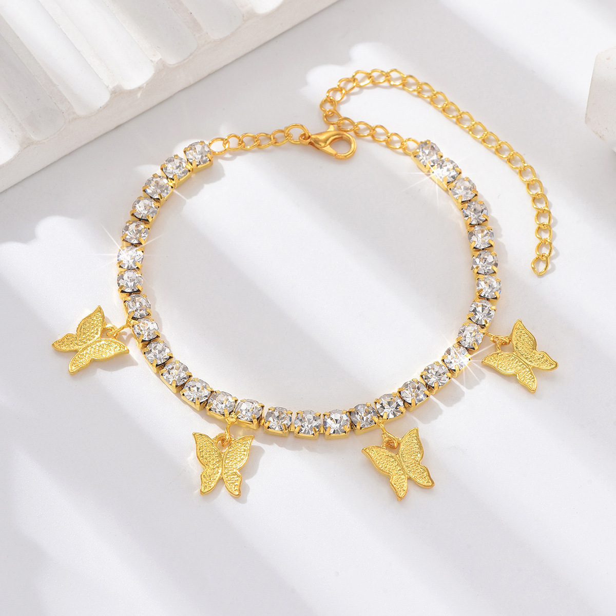 Venta cruzada creativa de diamante de mariposa correa de tobillo temperamento simple cadena de garra bordilla pie joyería de playa de moda