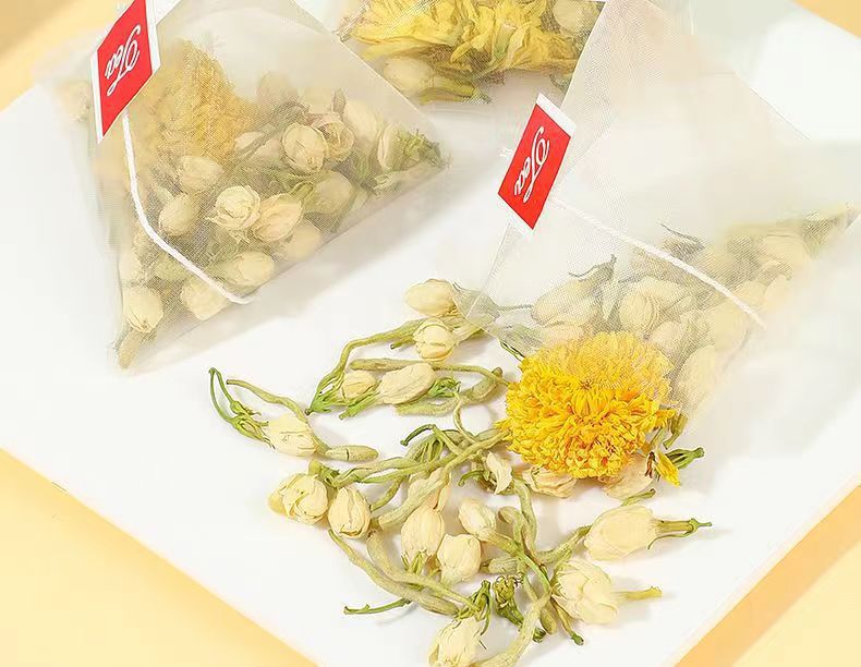 Three Flower Tea Jin Yin Hua Ju Hua Mo Li Hua Triangle Tea Bags 50 Count Sugar Free Herbal Blend in use