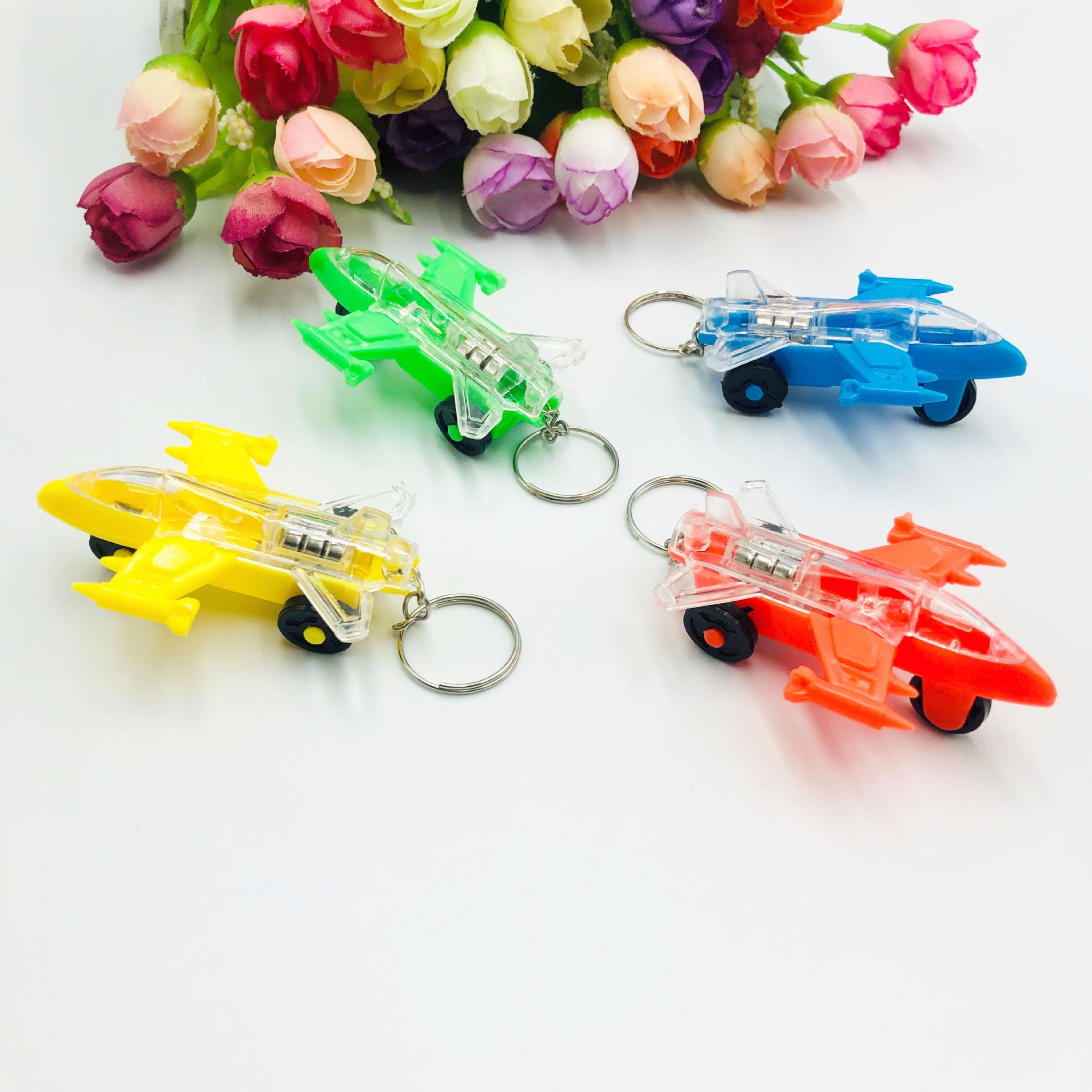 Aviones llavero luz colgante luminoso LED llavero de los niños juguete luminoso creativo pequeño regalo