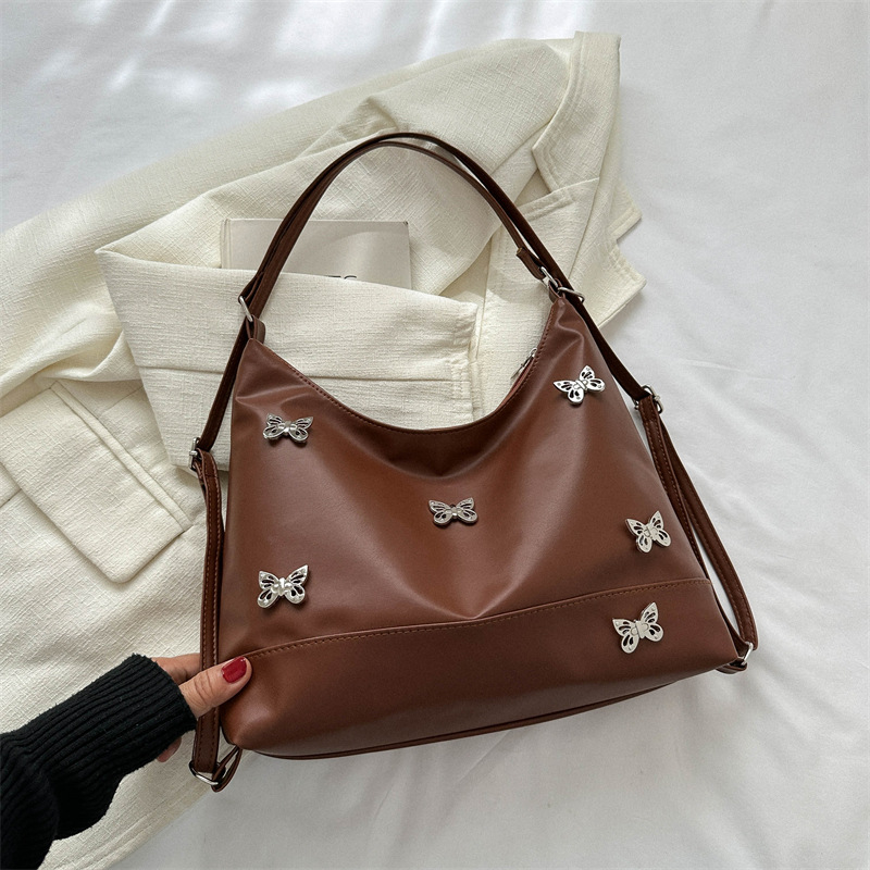 Cuero suave de gran capacidad moda textura Commuter suave bolsa de hombro las mujeres 2023 Otoño e Invierno estilo coreano bolsa