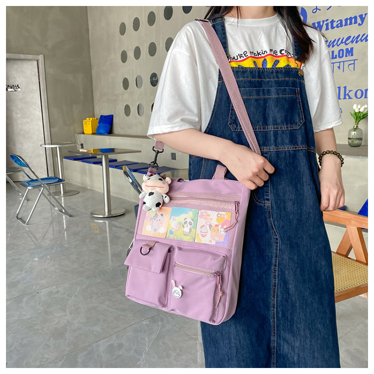 Large-capacity Japanese-style single-shoulder canvas bag for girls, versatile crossbody, ins, a tote bag for junior high school students' classes, and a schoolbag for after-school tutoring undefined