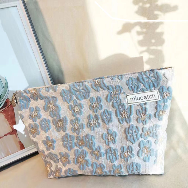 Retro literatura elegante portátil bolsas de maquillaje 2024 nuevo bolsas de maquillaje original nicho diseño mayorista