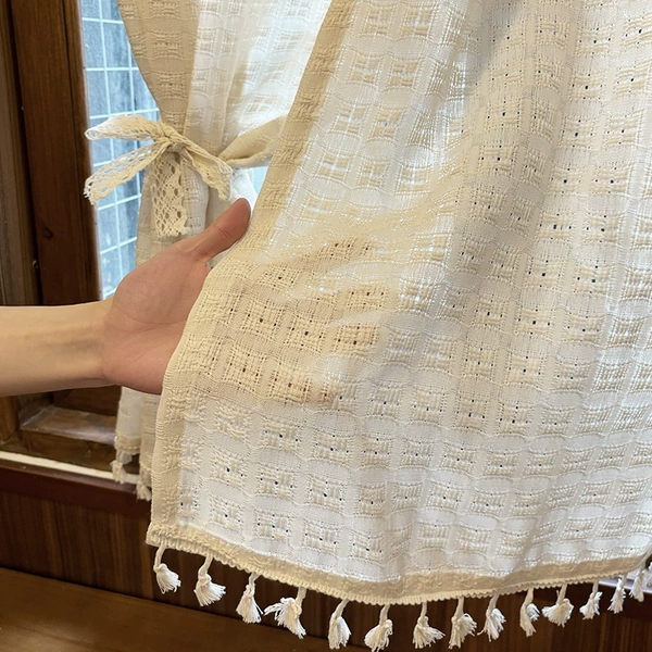 Tassels added to the bottom of the rice field pattern, punched