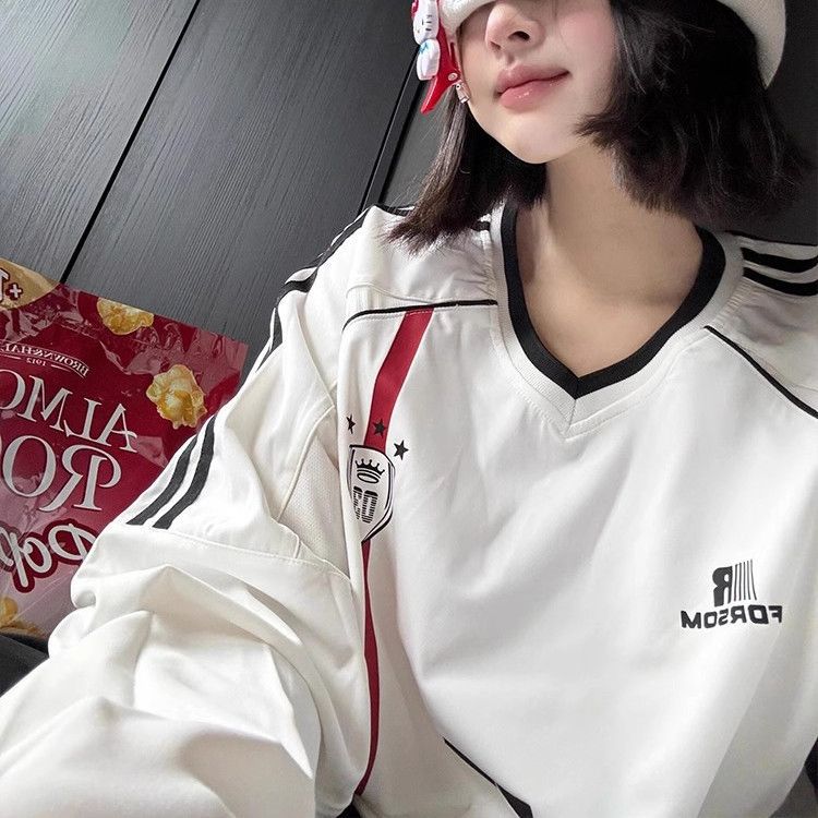 アメリカのレトロなスポーツは色vネックの長袖のtシャツの女性の朝の春のデザイン感が小さいです。