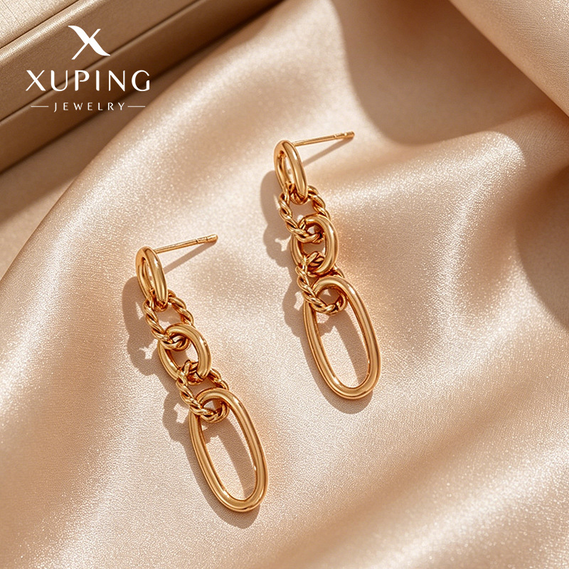 Pendientes de aleación Xuping estilo europeo y americano, pendientes largos ovalados retorcidos para mujer, joyería de moda de diseño exclusivo al por mayor.