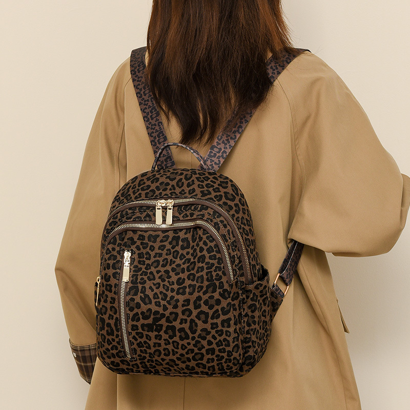 Comercio exterior al por mayor 2024 nueva moda leopardo mujer mochila casual color de contraste mochila de viaje ligera de gran capacidad