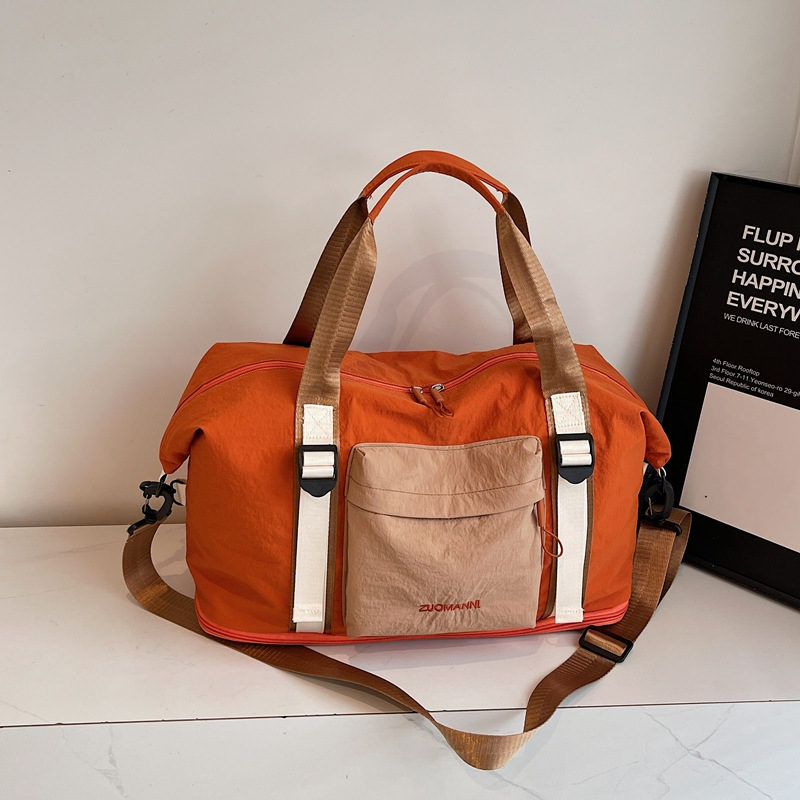 Bolsas de viaje al por mayor estilo empalme contraste de alto valor de equipaje expansión de gran capacidad bolsas de yoga deportivas bolsas