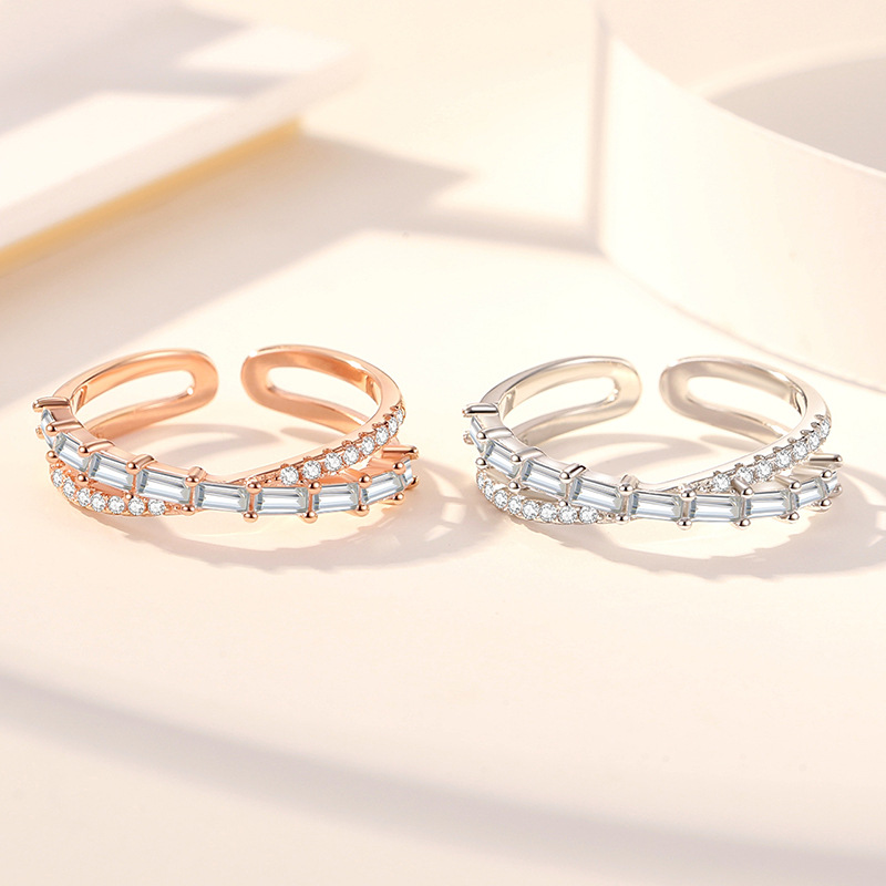 Anillo de nicho s925 plata entrelazada estilo coreano Cruz diamante con incrustaciones ZIRCON anillo femenino luz lujo alto sentido anillo moda lote