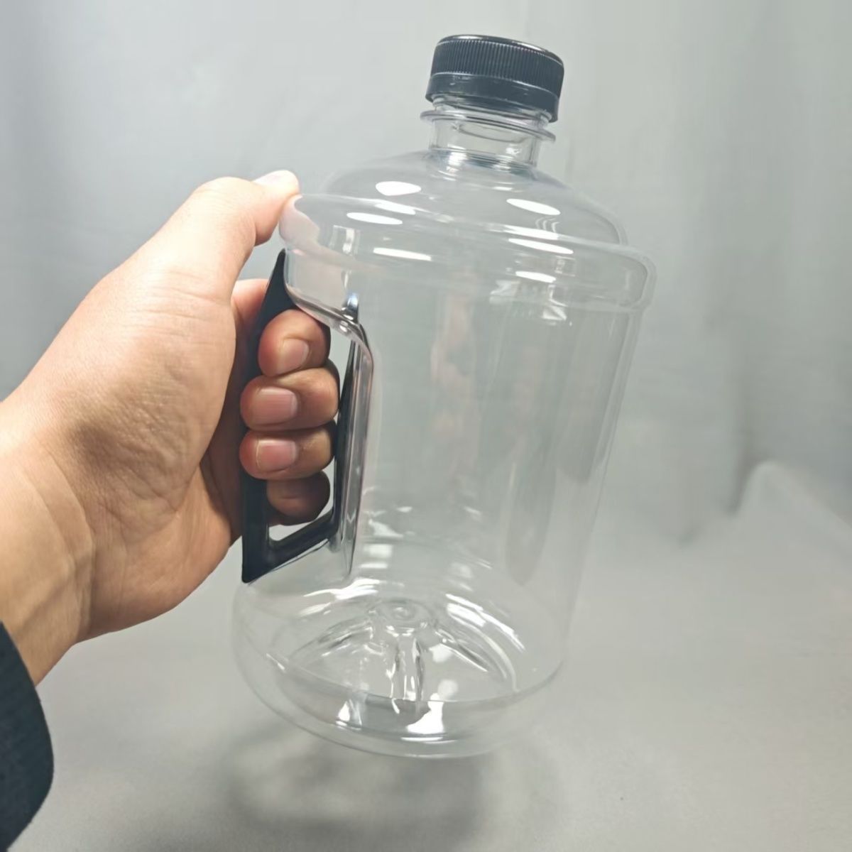 1.5升网红吨吨桶调酒分装瓶拧紧密封带把手塑料瓶塑料桶