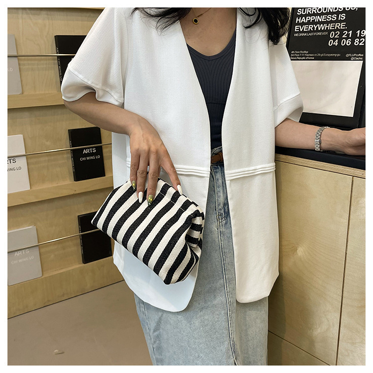 New cross-border fashion color-blocking striped cosmetic bag, women's loose change mobile phone storage bag, trendy and niche cloud clutch undefined