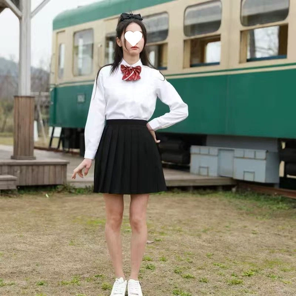 Female white long sleeves + black short skirt + red crown tie