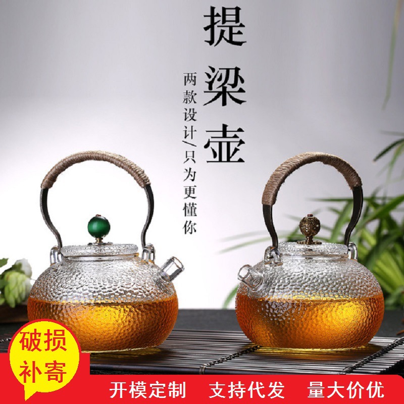 Fábrica al por mayor tetera de vidrio borosilicato hogar juego de té flor tetera de cobre martillado tetera fabricante de té