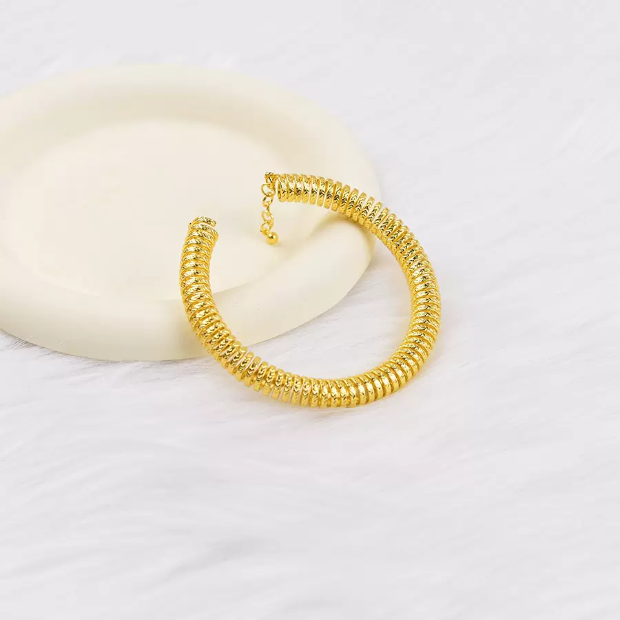 工厂定制跨境新款时尚光面金色弹簧手链复古网红风镂空手饰品批发