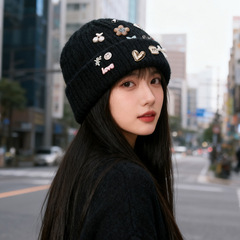 2025新款秋冬帽子女多纽扣粗线针织毛线帽保暖护耳包头帽套头冷帽