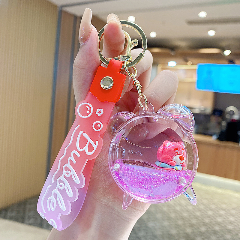 Botella de arena flotante de aceite flash fresas oso muñeca colgante llavero mochila para hombres y mujeres colgantes de automóviles pequeños regalos al por mayor