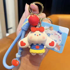 リンゴのウサギのキーホルダーネットの赤いかわいいウサギの贈り物の精巧な包みは車のキーチェーンのかわいい女性を飾ります。