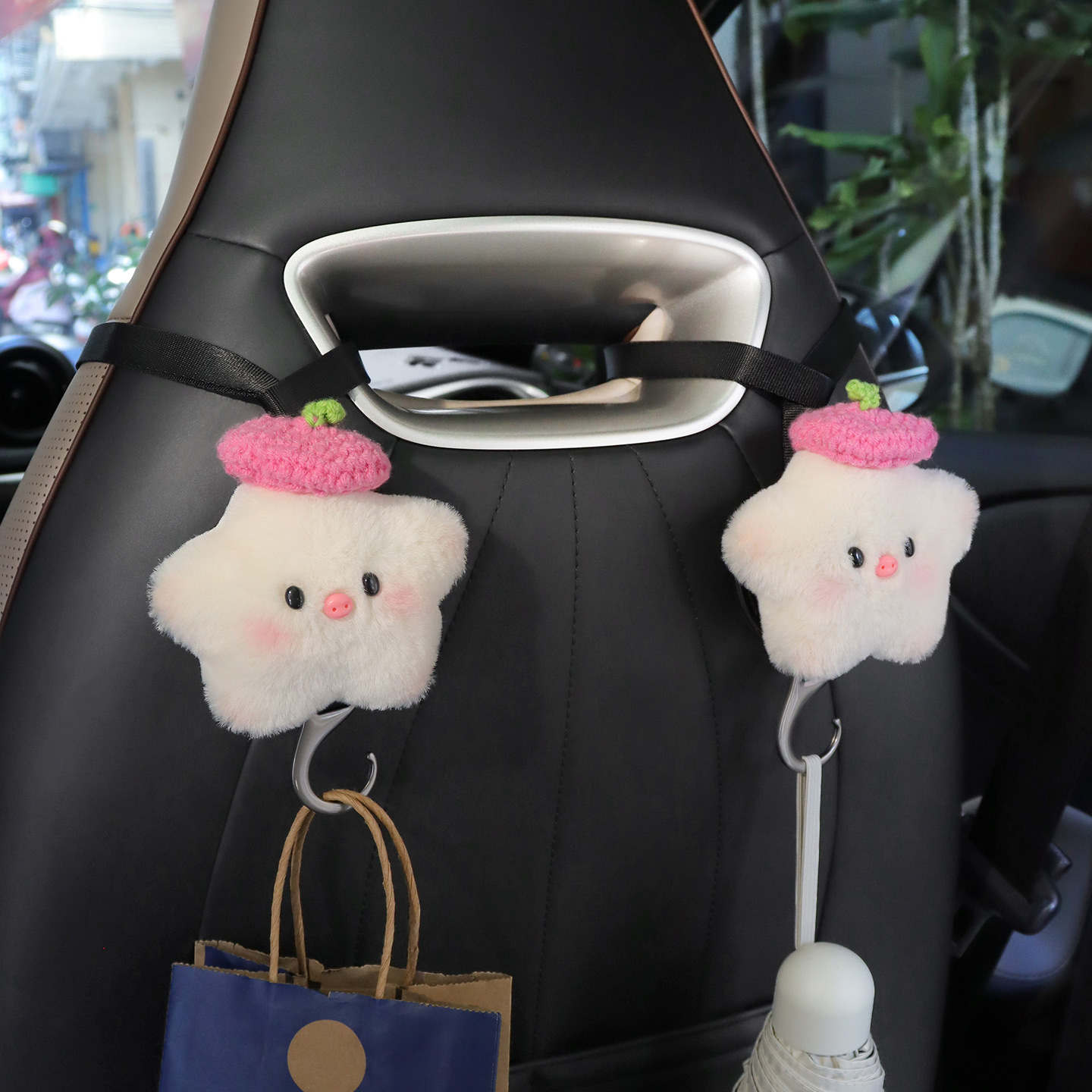 Automóvil trasero estrella cerdo creativo gancho de automóvil multifuncional todo en un asiento trasero gancho de dibujos animados gancho oculto