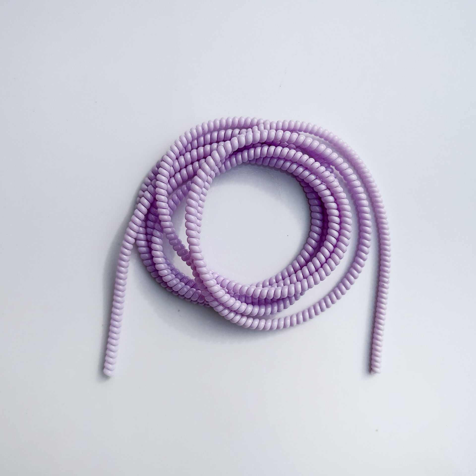 1.4 Cuerdas de protección de color sólido de 1,6 metros de cable de datos para línea de teléfono celular anti-ruptura cargador de cable de bobinado