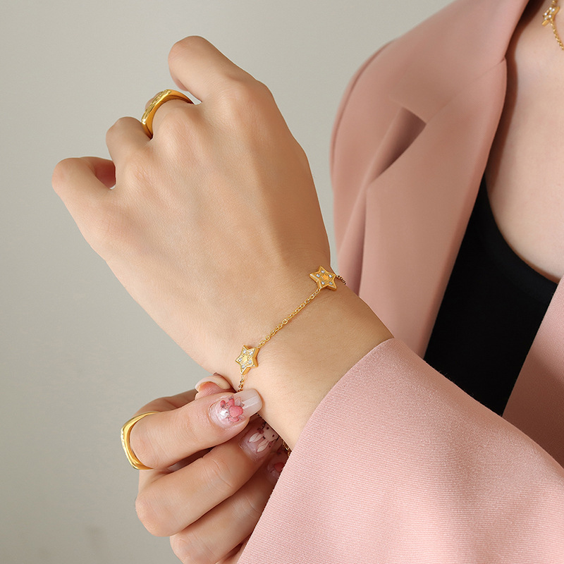 Europea y Americana de cinco puntas de circón Luz de lujo todo fósforo collar pulsera mujer transfronteriza de titanio de acero de la vendimia joyería al por mayor traje de la joyería