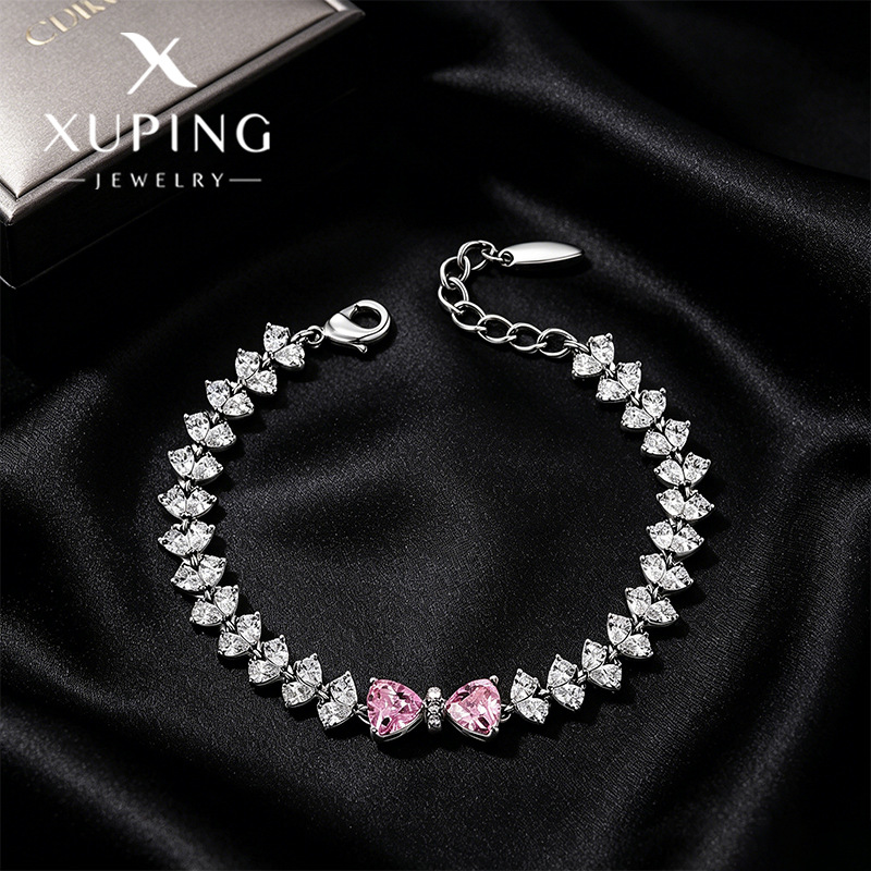 Xuping gemas artificiales incrustadas amor empalme pulsera arco de color aleación de cobre temperamento elegante joyas al por mayor