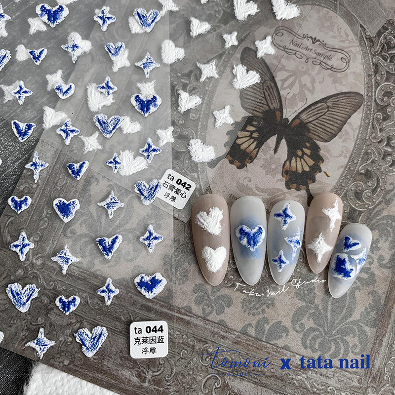 Nuevo relieve pegatinas de uñas de yeso japonés en forma de corazón Klein azul tridimensional en blanco y negro partículas fototerapia pegatinas de uñas