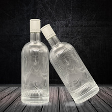 生产厂家直售创意条纹晶白料透明玻璃花果酒瓶密封空酒瓶500ml