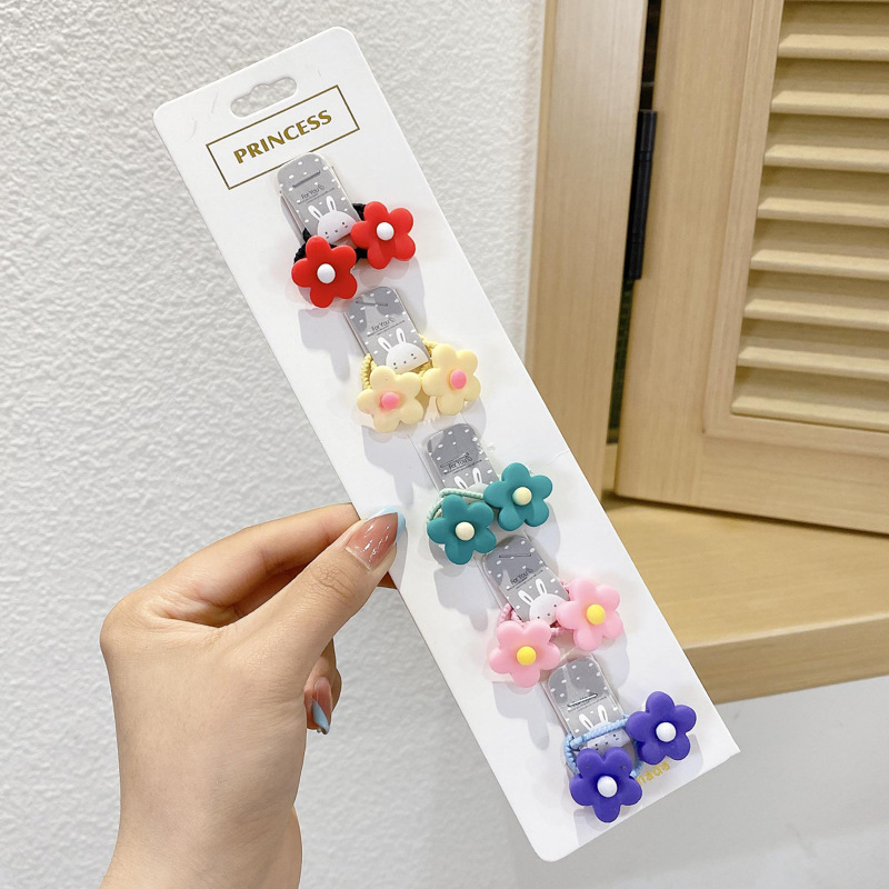 Los niños de la banda del pelo del bebé de la historieta no lastiman la banda de goma del pelo de la niña volumen del pelo menos cuerda del pelo del bebé