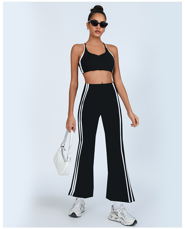 Comercio exterior transfronterizo europeo y americano nuevo traje de yoga belleza femenina chaleco cruzado de color de contraste cintura alta pantalones acampanados blancos de secado rápido