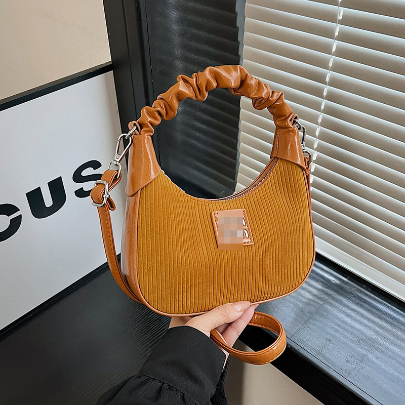 Bolsos de axila populares transfronterizos para mujer 2025 nuevo bolso de bola de masa de moda retro bolso de mensajero de un solo hombro plisado de terciopelo