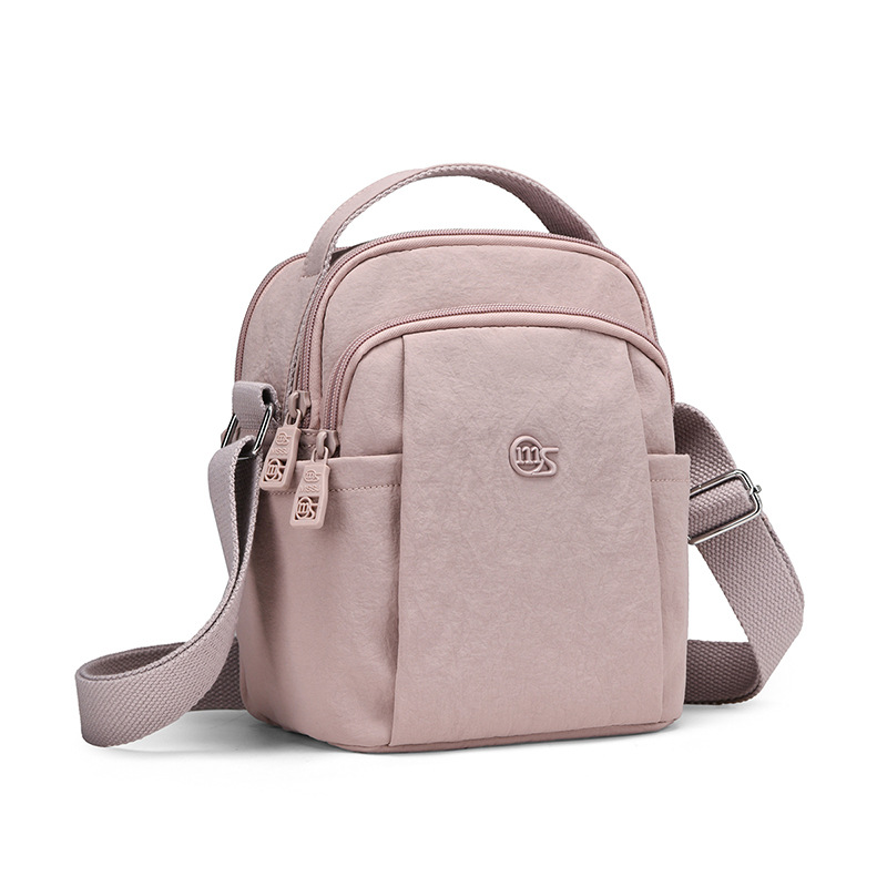 Fashionable and simple small round bag for women, 2026 new nylon crossbody bag, lightweight and versatile commuter shoulder bag, direct from the manufacturer