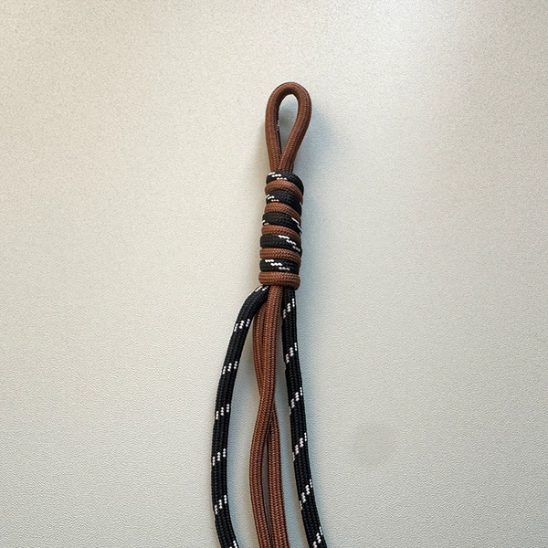 E12 knot black with brown